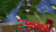 Pillagers raiding a home-made village (Image via u/pewds122222 on Reddit)